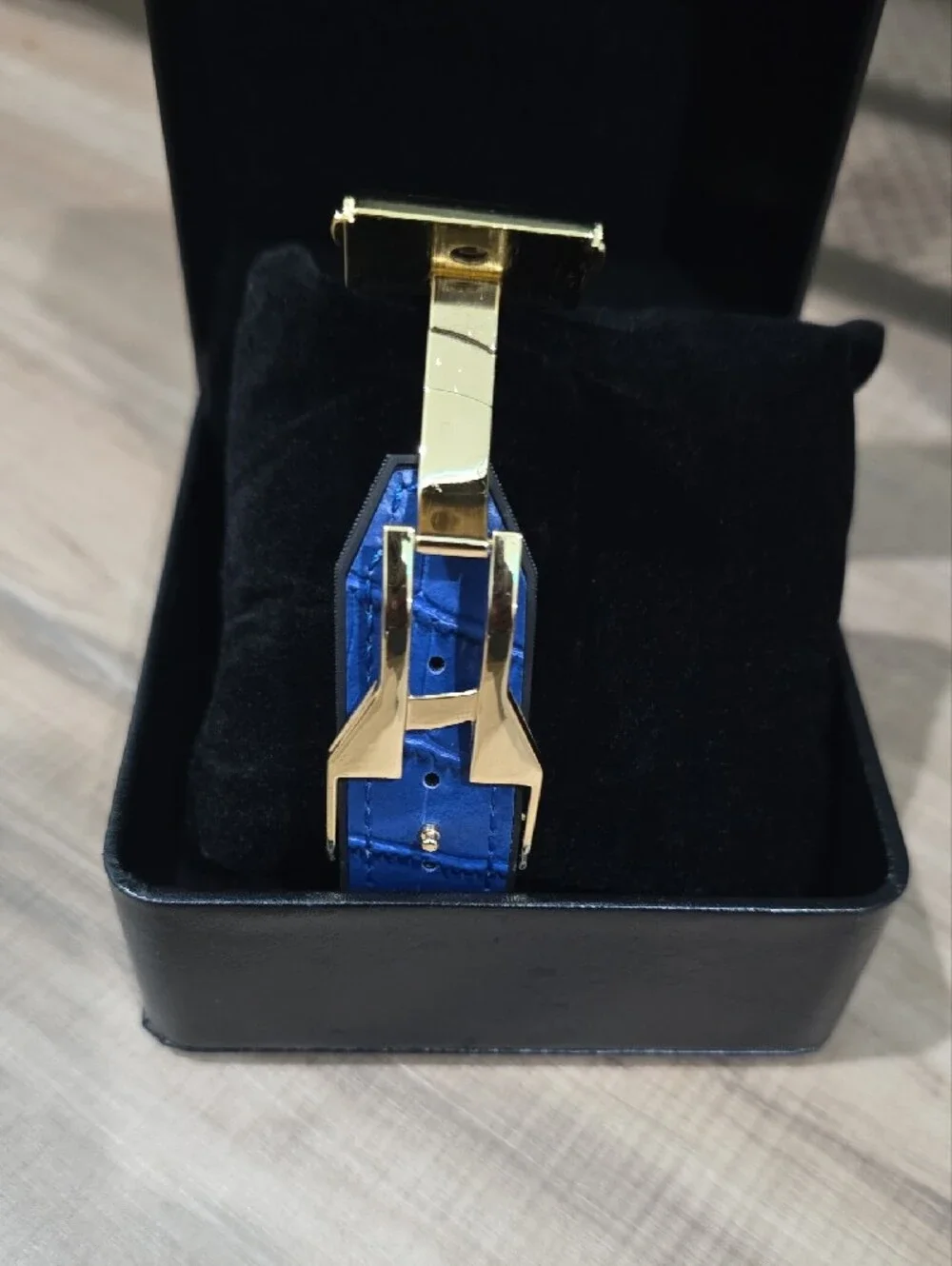 Gold Crystal Dial Men's Watch with Blue Strap